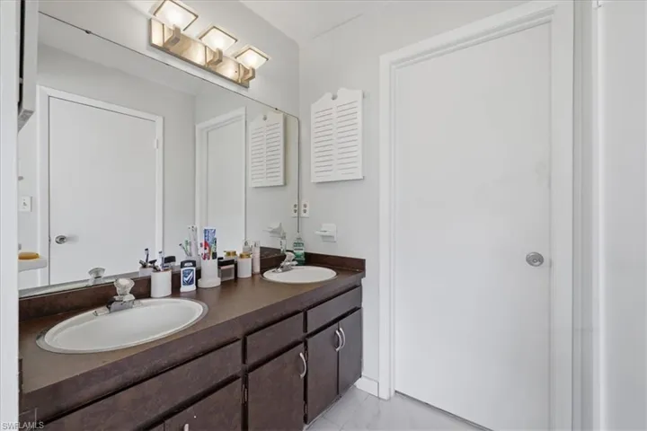 Bathroom featuring double vanity
