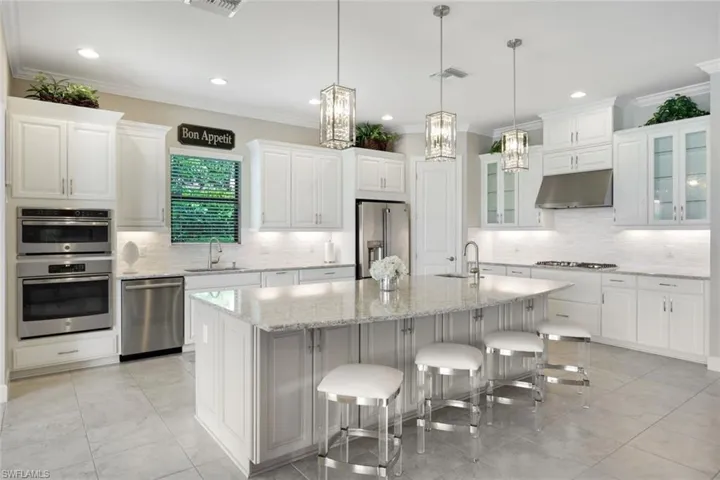 Kitchen with an inviting 3 crystal like pendants