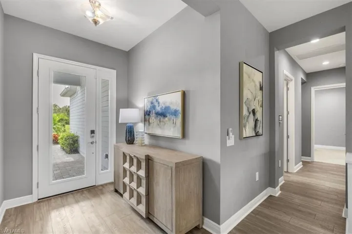 Entryway with ceramic wood-style flooring