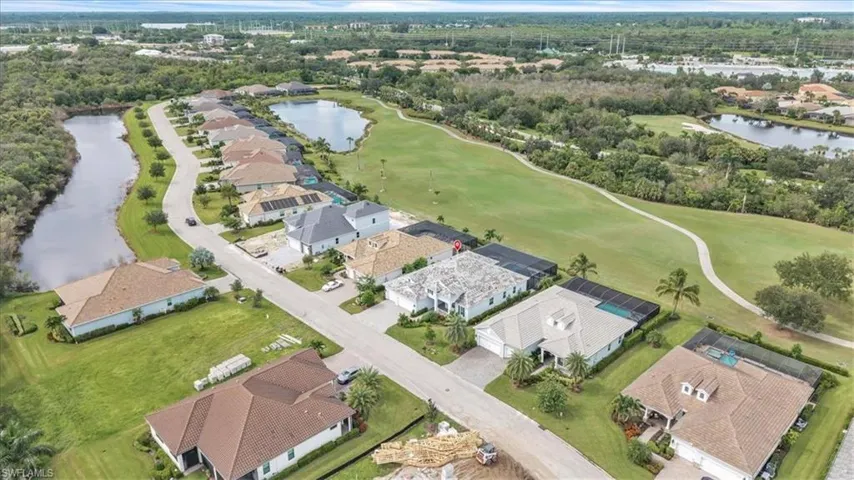 View of property location with nearby suburban area and a large body of water