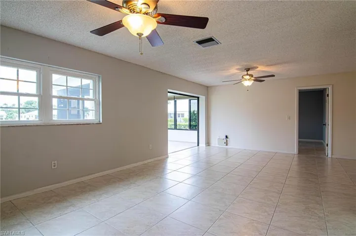 Bright and spacious Family Room with easy outdoor access!
