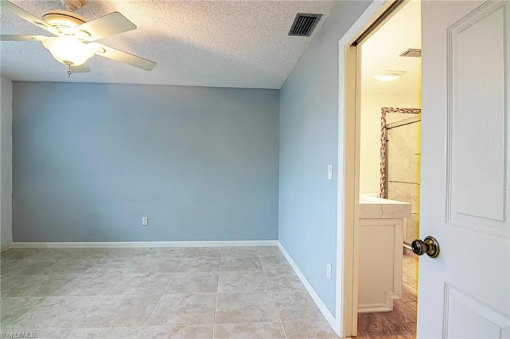 Primary bedroom with en suite bathroom