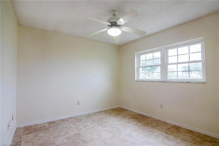 Guest bedroom located close to half bath
