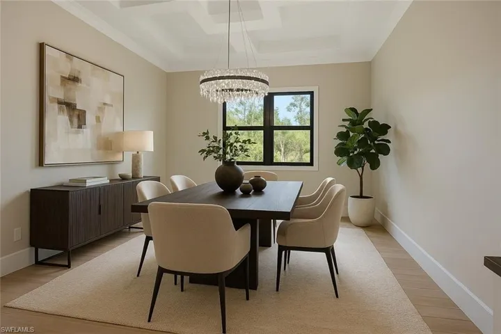 Dining space with crown molding, coffered ceiling, light wood-style flooring, baseboards, and a notable chandelier