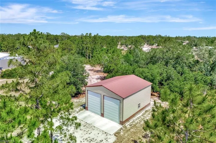 Drone / aerial view of a heavily wooded area