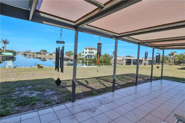 View of patio featuring a water view
