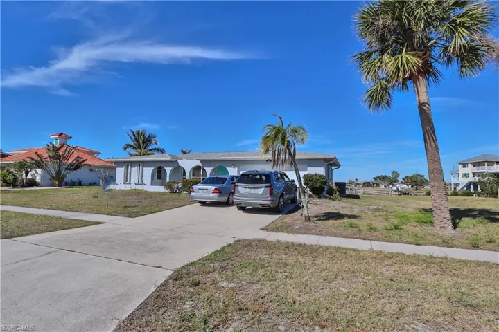 Single story home featuring a front yard