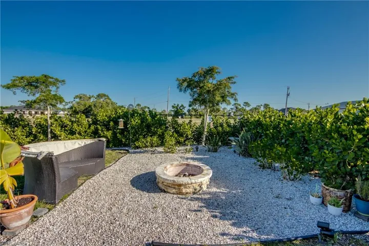 View of yard featuring a fire pit