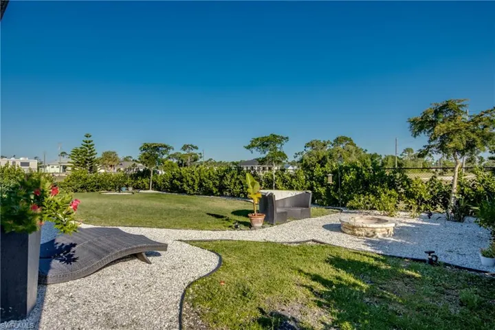 View of yard featuring a fire pit