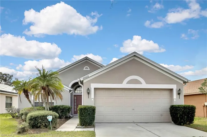 Ranch-style house with a garage