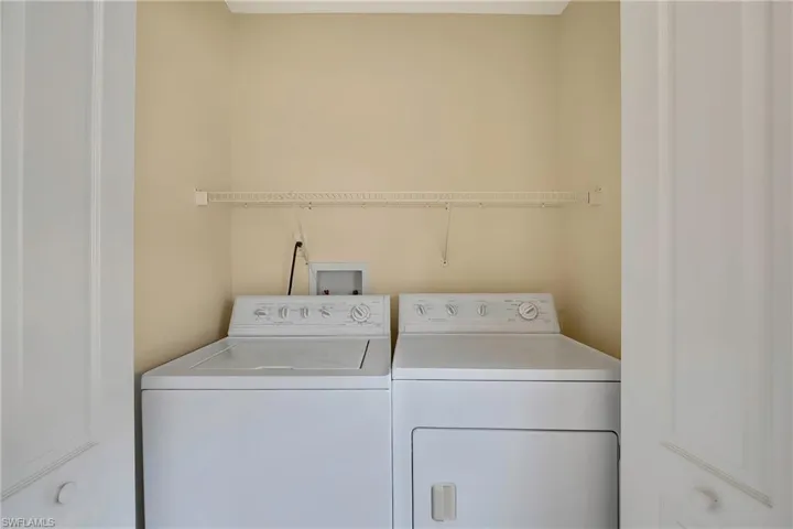 Clothes washing area with washer and dryer