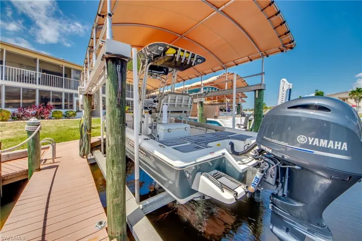 View of Boat Dock with Lift & Canopy.