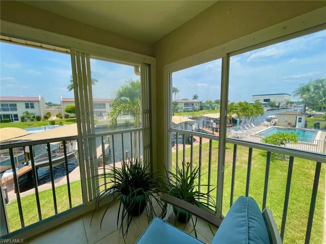 Gorgeous Views from Your Huge Lanai that Overlooks Sparkling Pool, Gulf Access Canal & Docks!