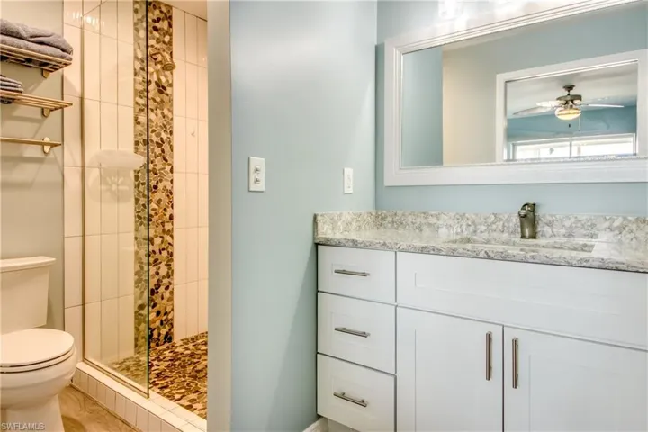 Updated Bathroom with Vanity & Walk-in Closet with a Pocket Door.