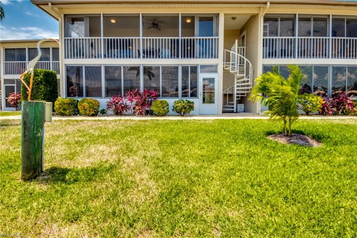 Back of Condo with Spiral Staircase to Dock!