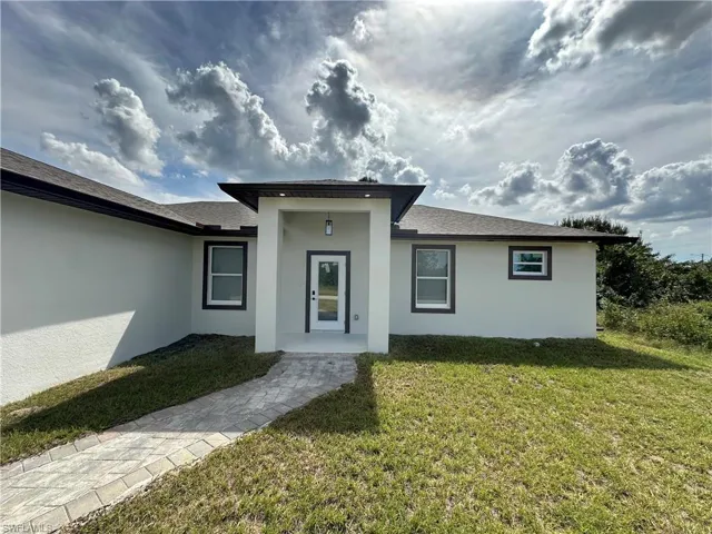 View of front of home with a front lawn