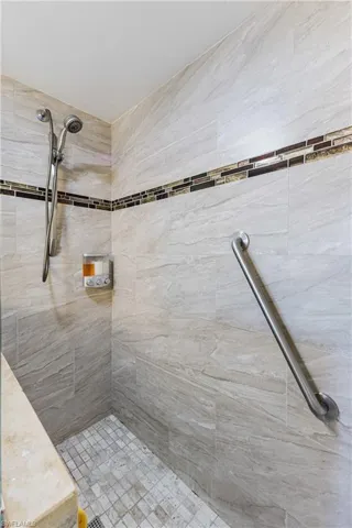 Bathroom with tiled shower