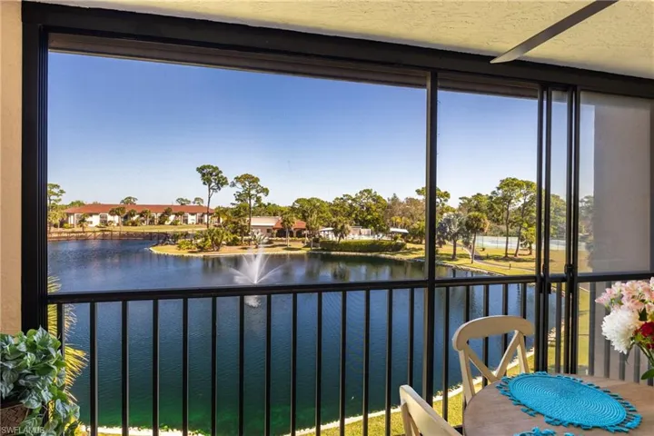 Sunroom with a water view