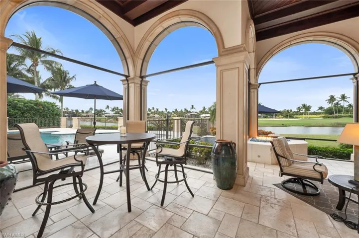 View of patio / terrace with a water view and outdoor dining area
