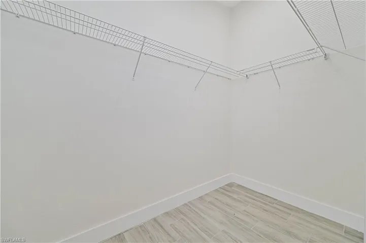 very large main bedroom walk in closet