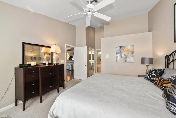 Master Bedroom with King size bed, volume ceilings and walk in closets