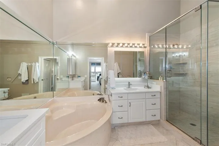 Master Bathroom with new separate dual sinks, vanities, quartz counter tops and fixtures
