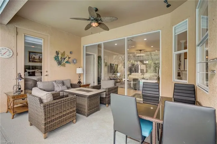 View of patio / terrace with ceiling fan and outdoor lounge area