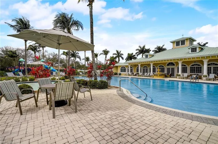 View of swimming pool with a patio area