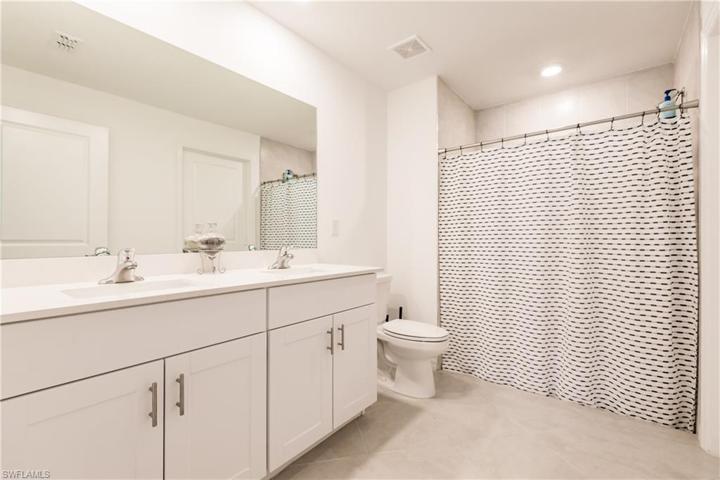 Your en-Suite full bath. Spacious and bright - dual sinks.