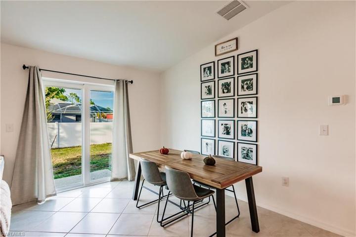 Dining Area w/those lovely  tiled floors