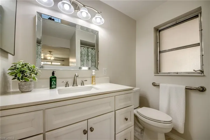 Bathroom featuring vanity and a shower with curtain