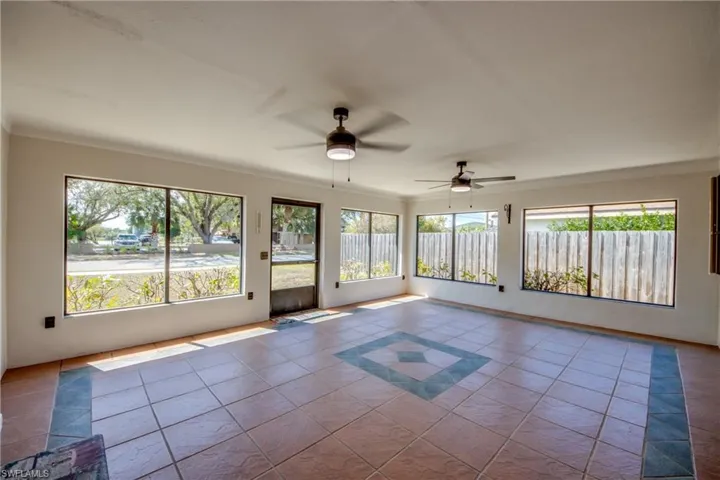Empty room featuring a ceiling fan
