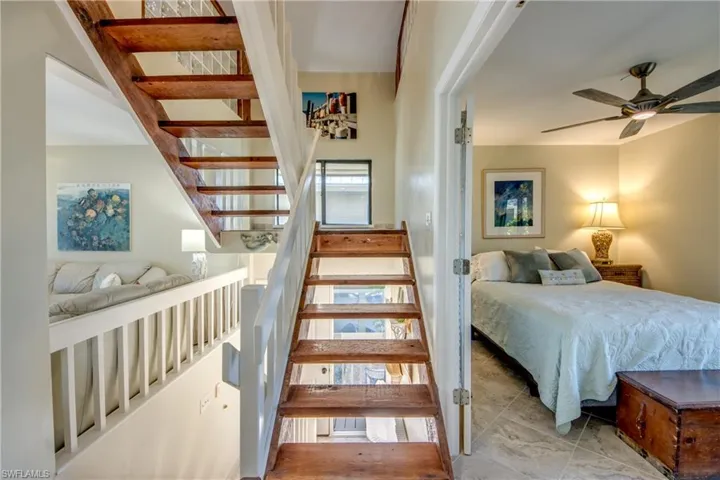 Staircase with a ceiling fan