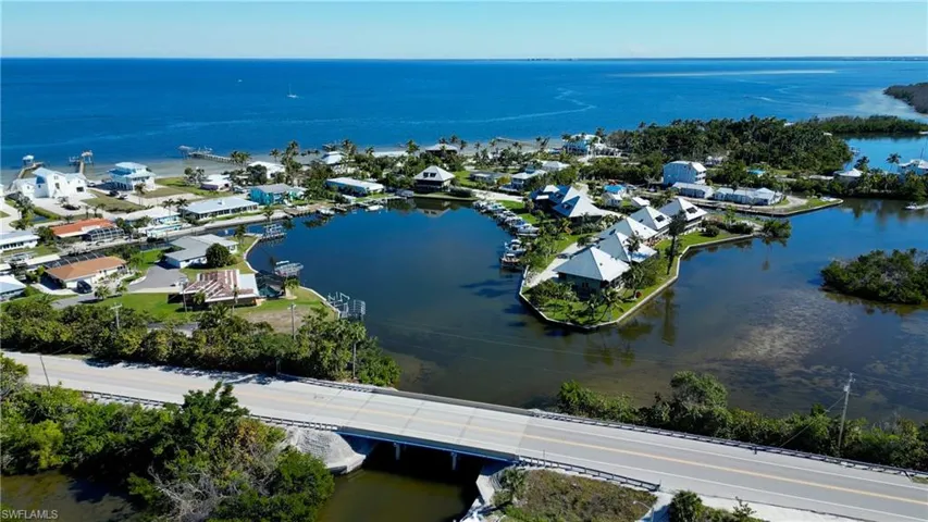 Bird's eye view with a water view and a residential view