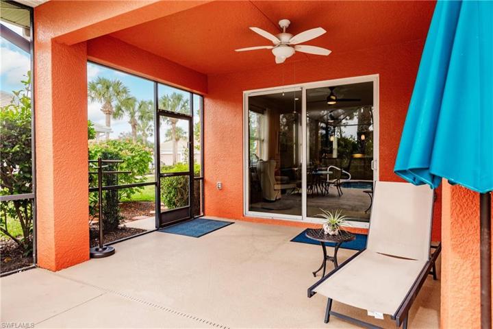SLIDING IMPACT GLASS DOORS TO THE LANAI!  NOTE: HOME HAS IMPACT WINDOWS & DOORS THROUGHOUT!
