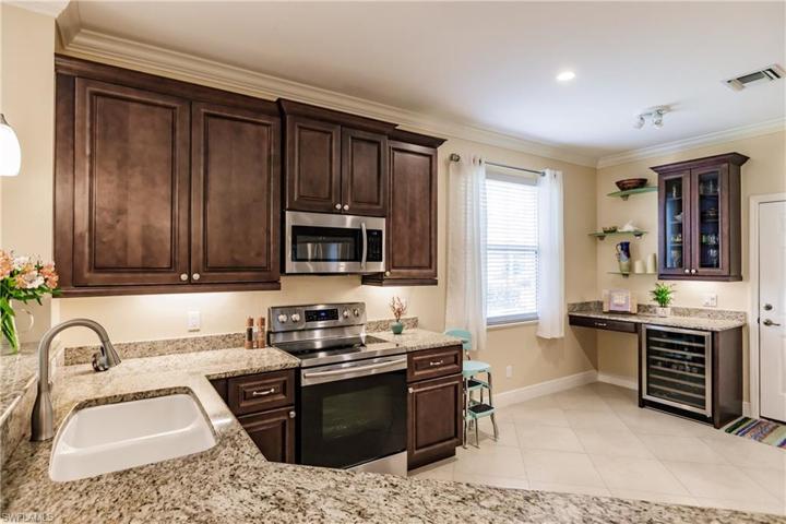 CROWN MOLDING WITH LED LIGHTING & TILE FLOORING THROUGHOUT THE HOME!