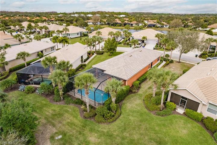 GREAT LANDSCAPING WITH THE PALM TREES CREATES A TRUE PARADISE TO ENJOY! YOU MUST SEE IN PERSON TO TRULY APPRECIATE THE BEAUTY OF THIS POOL HOME!