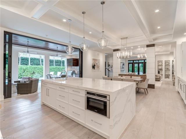 Pull-out drawers add a touch of practicality, seamlessly combining style with organizational efficiency