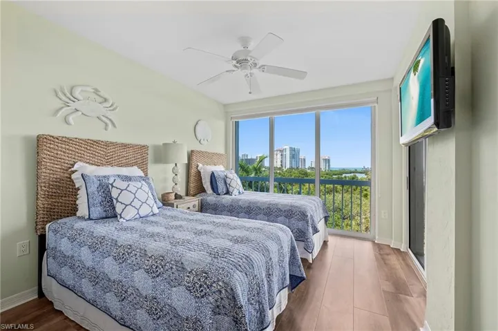Guest bedroom with access to balcony