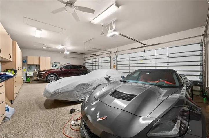 Car buff? Four car garage here, with two more spaces through another door