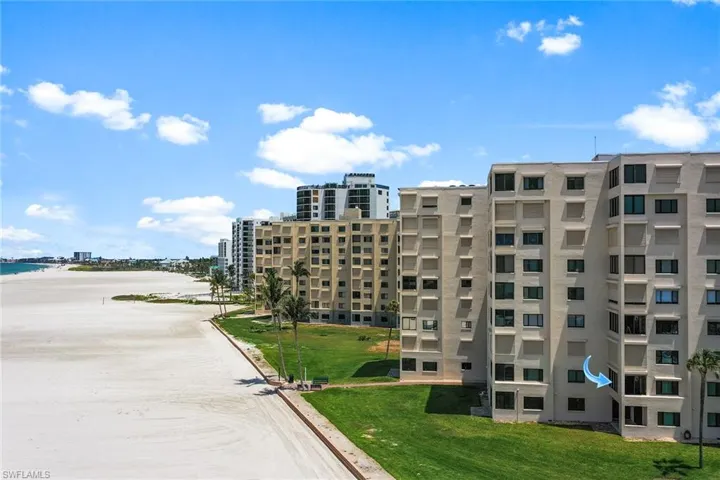 View of apartment building / complex with a water view