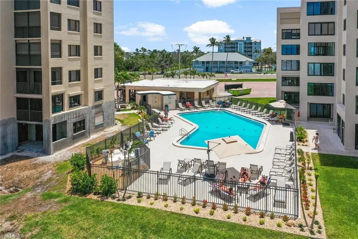 Community pool featuring a patio area