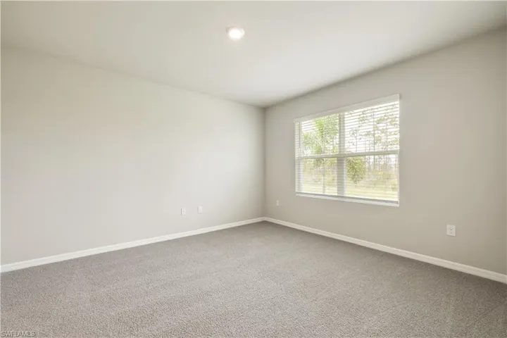 Unfurnished room featuring carpet floors
