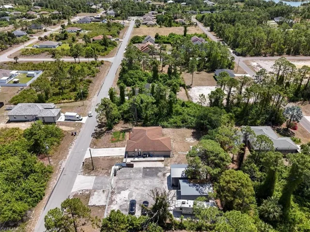 Birds eye view of property with a residential view