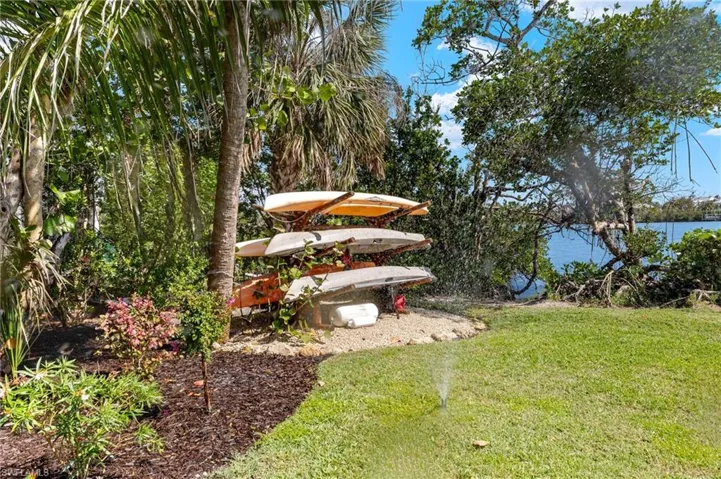 View of grassy yard featuring a water view