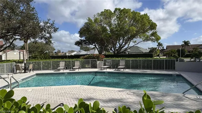 View of swimming pool with pool deck area