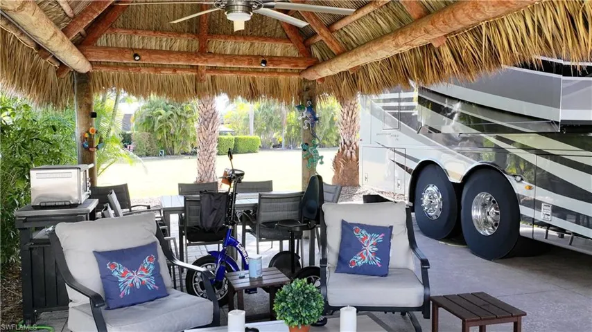View of patio featuring a ceiling fan and outdoor dining space