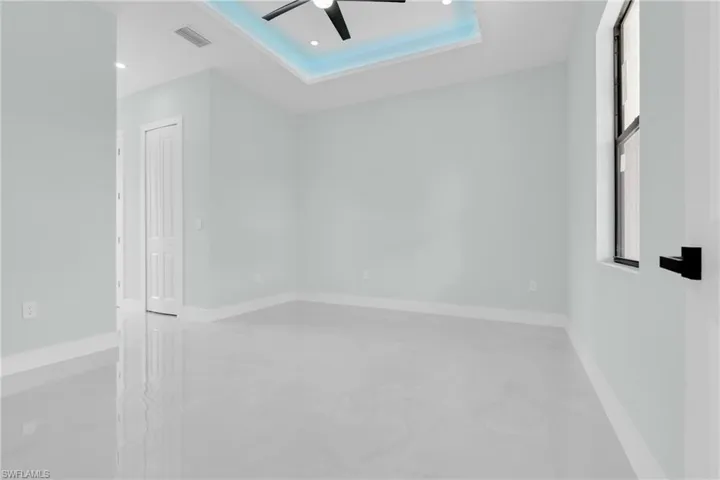 Unfurnished room with ceiling fan, concrete floors, and recessed lighting