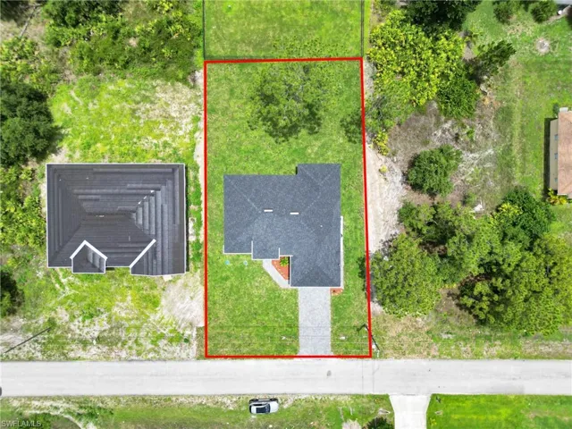 Aerial view of property's location with property parcel outlined