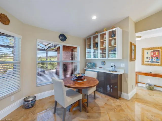 Dining space with vaulted ceiling